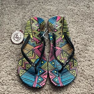 SO Black and Yellow Patterned Flip Flops
